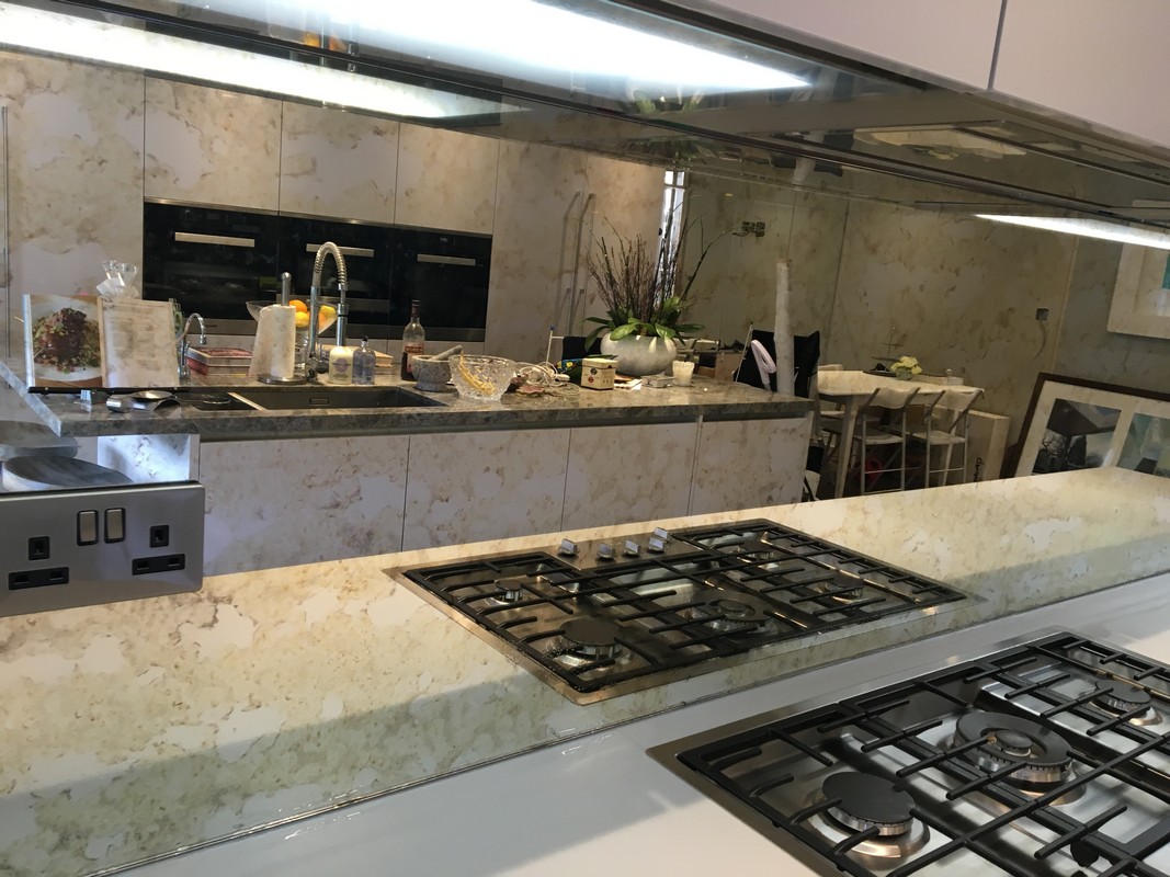 Mirror glass splashback in Brent Cross luxury kitchen