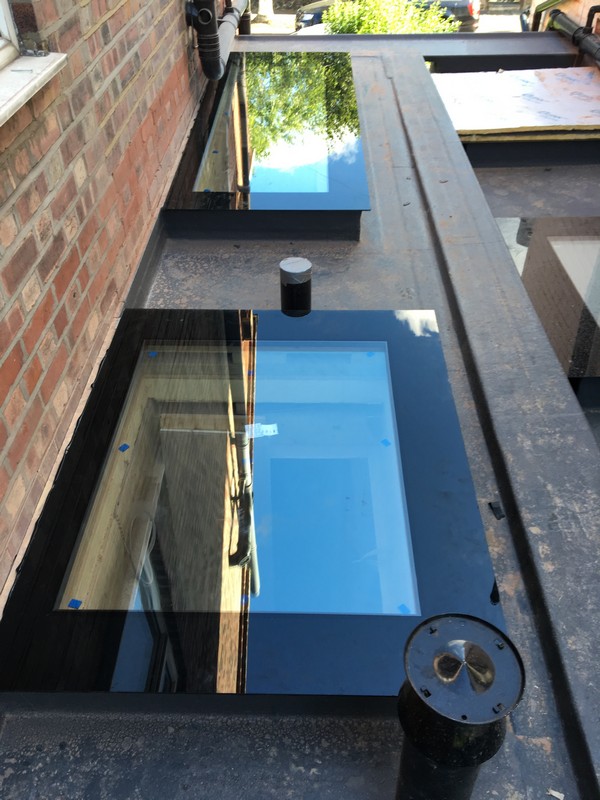 Multiple flat roof skylights on extension in Brent Cross